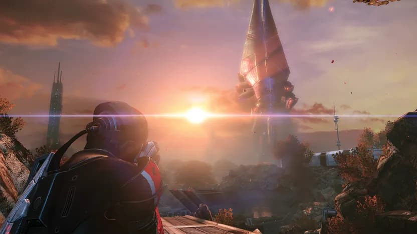 Mass Effect Legendary Edition official screenshot of Shepard looking at the Citadel tower at sunset